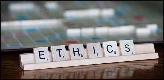 Scrabble tiles spelling "ethics"