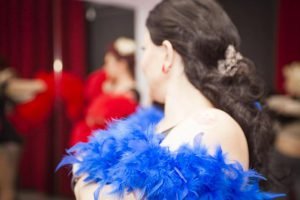 Performer with feather boa