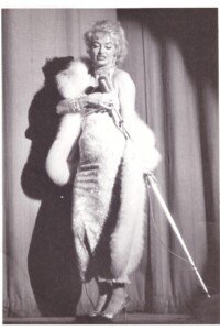 Burlesque dancer Dixie Evans performs